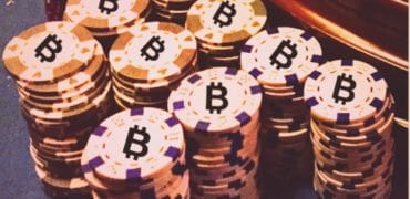 Casino chips with bitcoin sign