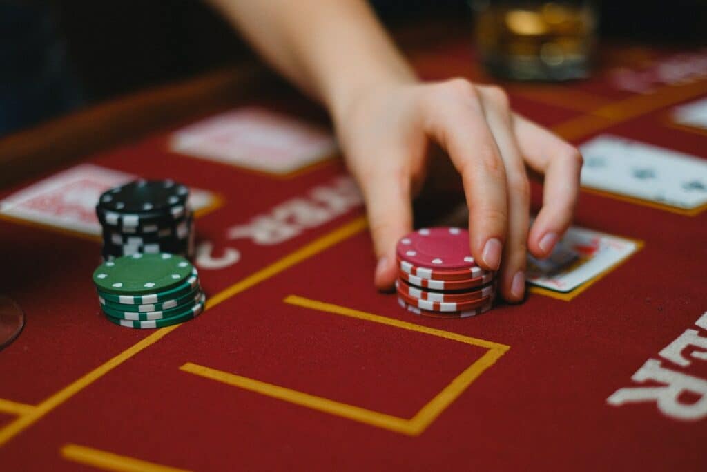 hand moving poker chips featured image